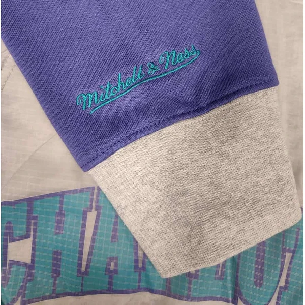 sudadera con capucha Charlotte Hornets Tie Breaker de Mitchell and Ness